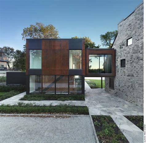 Contemporary Addition Enhancing Old Stone House Design With Symbolic