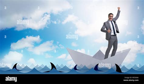 Excited Businessman Riding Paper Ship Boat Stock Photo Alamy