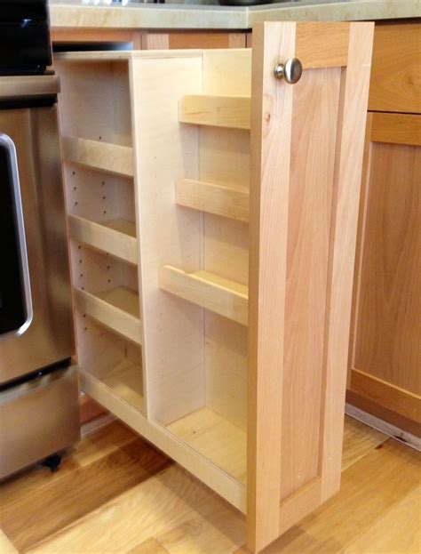 Another great safe saving spice rack is the pull down spice rack. Handmade Pull Out Spice Rack by Noble Brothers Custom ...
