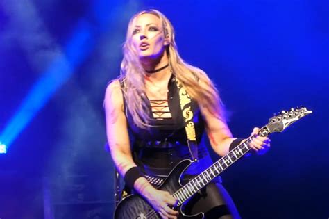 Nita Strauss Gets Hit In Head By Flying Broken Cane Piece During Alice