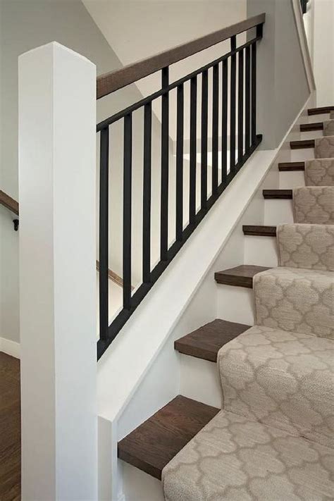 Stair case with black painted handrail and newell post and also stair risers painted black. 80 Modern Farmhouse Staircase Decor Ideas 3 | Staircase ...
