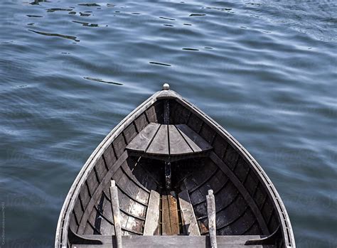 Detail Of Wooden Row Boat Floating In Water By Stocksy Contributor