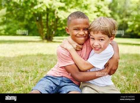 Two Kids As Friends Fighting With Each Other For Fun Stock Photo Alamy