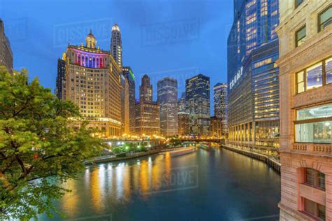 View Of Chicago River And Buildings Illuminated At Dusk Chicago