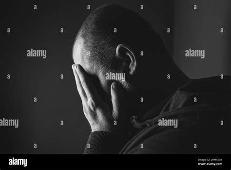 Man Sitting In Dark Room Black And White Stock Photos And Images Alamy