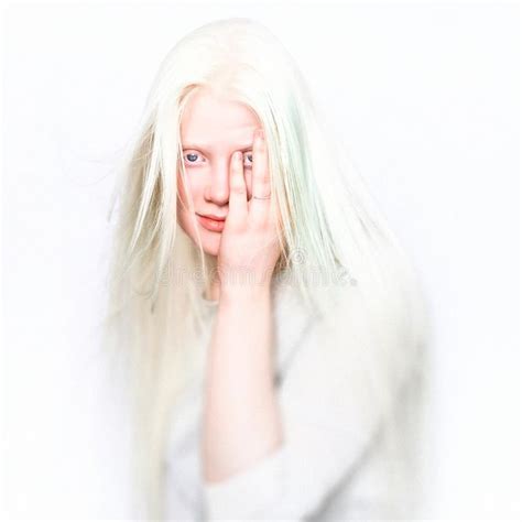 Albino Woman With White Pure Skin And White Hair Photo Face On A Light Background Portrait Of