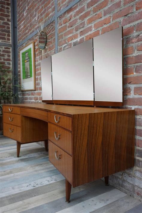 5 drawers to keep accessories organized. Wooden Teak and Curved Dressing Table at 1stdibs