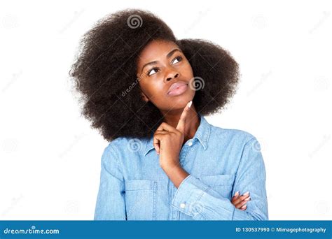 Close Up Thinking Young Black Woman With Afro Looking Up At Copy Space