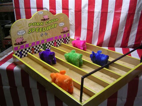Although carnival games can appear easy, they're often deceptively difficult to win. Pig Race | Fun Services Midwest