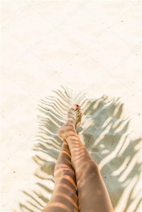 Woman At Beach Under Palm Tree With Leaf Shadow Stock Photo Netfalls