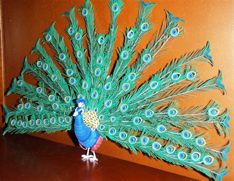 A Blue And Green Peacock Standing On Top Of A Wooden Table Next To A Wall