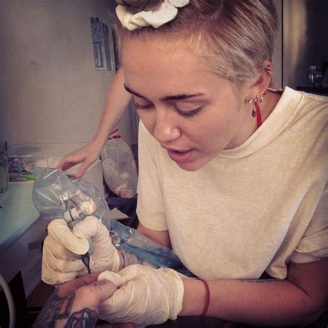 Miley Cyrus Gave A Tattoo To The Bravest Mortal On Earth