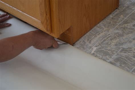 Keep your cut parallel to the walls, and see if the center of the. How to install vinyl flooring | Pro Construction Guide