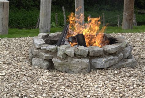 A quick search online for fire pit designs will have you overwhelmed with possibilities. Building A Stone Fire Pit - Landscapers - Talk Local Blog ...