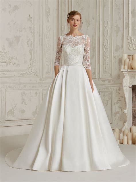 Buy amazing wedding jackets or wedding dress topper online at tulipbridal.com. Princess wedding dress with long sleeves and beading ...