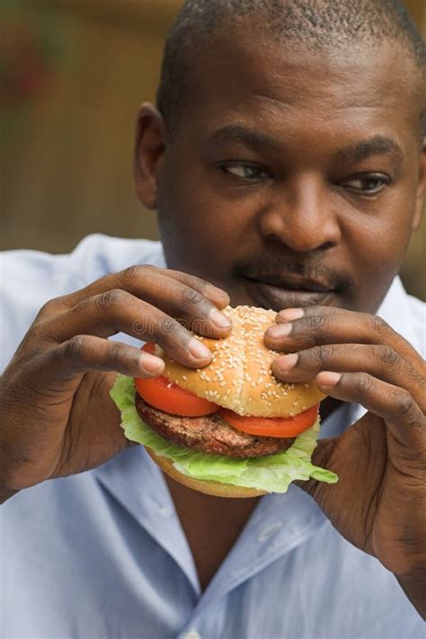 Man Eating Hamburger Stock Photos Image 2651313