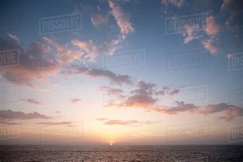 Sunrise Over The Ocean Stock Photo Dissolve
