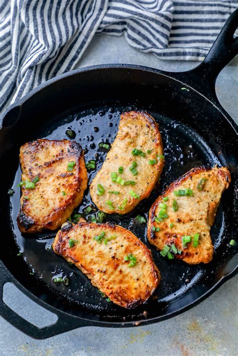 Baked thin pork chops make this sheet pan dinner quick and tasty! Easy Baked Pork Chops Recipe - Sweet Cs Designs