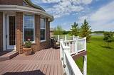 If you want to tame a slope in your backyard, a raised deck or platform deck can help with backyard access. 27 Red Brick House Front Porch Ideas - Home Decor Bliss