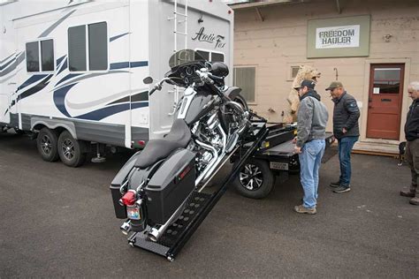 And headquartered in middlebury, indiana manufactures coachmen branded class a motorhomes, class c motorhomes, fifth wheels and travel trailers. Loading a motorcycle onto the Freedom Hauler | Trailer Life