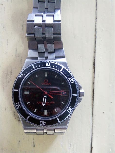 wismasarjana: jam tangan arloji omega seamaster quartZ