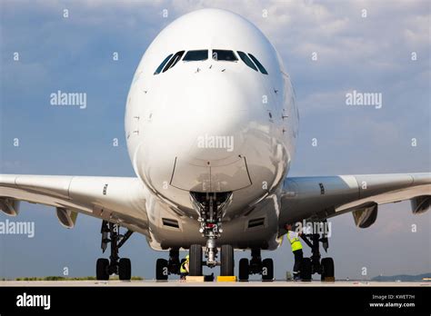 Airbus A380 Jumbo Jet Take Off Preparation By Ground Crew People At