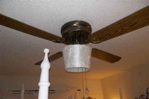 Oil rubbed bronze finish with burnished teak wood details and blades handsomely accent the metal mesh cage. Little, Bitty Damn Houze!: Drum Shade For Ceiling Fan
