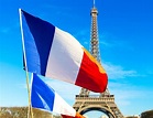 French Flag Waving In Paris, France Stock Photo - Image of holiday ...