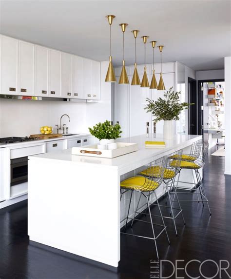 The Kitchen Island And Counters In This New York Home Are Topped With A