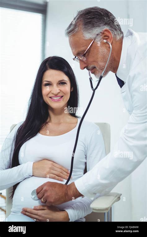 Doctor Examining Pregnant Woman Stock Photo Alamy