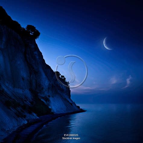 Moon Rising Over Tranquil Sea And Mons Klint Cliffs Denmark Stocktrek Images