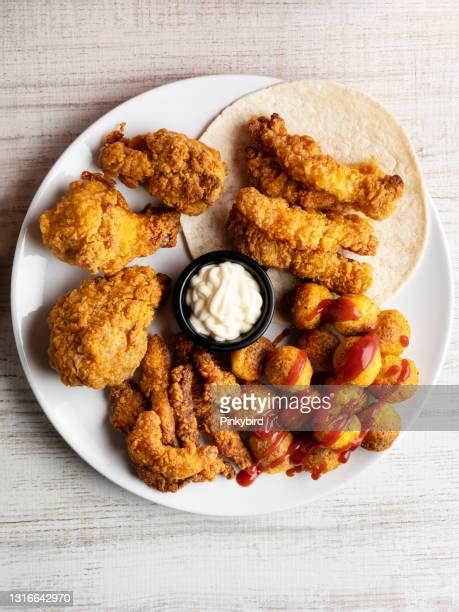 Spicy Chicken Nuggets Photos And Premium High Res Pictures Getty Images