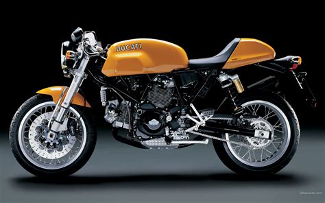 The ducati sportclassics were a range of retro styled motorcycles introduced by ducati at the 2003 tokyo motor show, and put on sale in 2005 for the 2006 model year. Triumph Thruxton R x Ducati Sport Classic - Influx