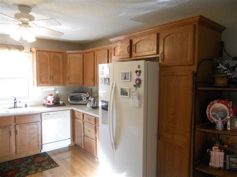 Pack a punch with freshly painted kitchen cabinets. Pictures Before And After Antique White Painted Kitchen ...