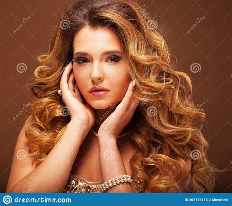 Beaity And Fashion Concept Blond Woman With Long Healthy And Shiny Curly Hair Stock Image
