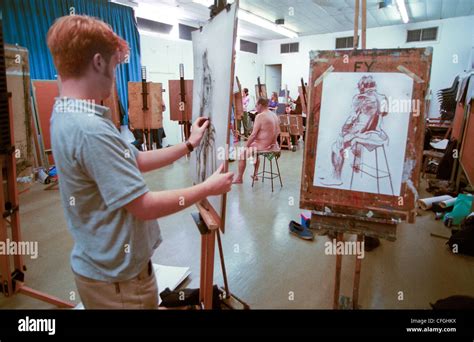 Art Students Painting A Naked Elderly Overweight Male Model Stock Photo