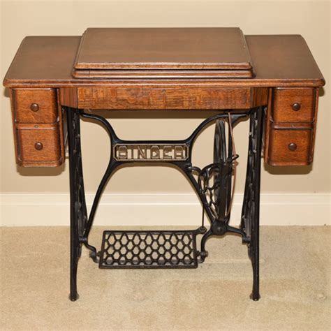 antique singer sewing machine and tiger oak table ebth