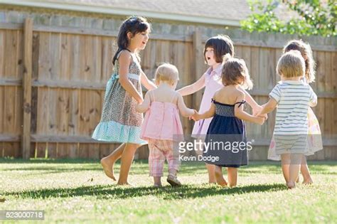 Children Playing Ring Around The Rosy High Res Stock Photo Getty Images