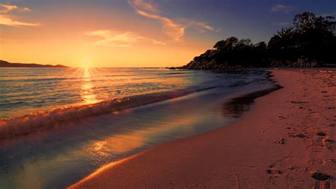 1366x768 Sea Sunset Beach Sunlight Long Exposure 4k