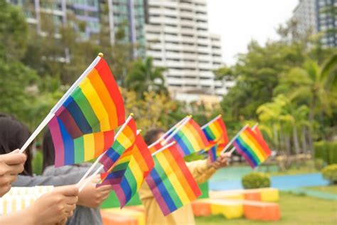 Premium Photo Diversity People Hands Raising Colorful Lgbtq Rainbow