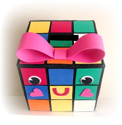 Cardboard heart feet and toilet paper. Peppermint Plum: {RUBIE - My Rubiks Cube Valentine Box}