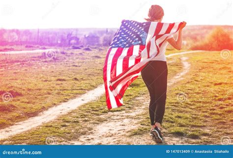 Women Running In The Field With American Flag USA Celebrate Th Of July Stock Image Image Of