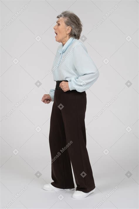 Side View Of An Old Woman Gaping In Shock Photo