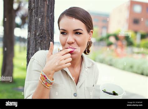 Woman Licking Her Finger Hi Res Stock Photography And Images Alamy
