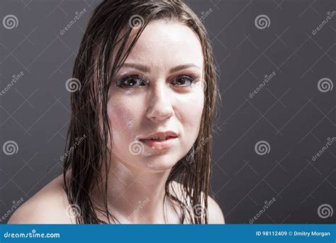 Caucasian Sensual Brunette Showing Wet And Shining Skin And Wet Hair