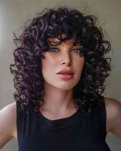 Most Popular Ways To Get Curly Hair With Bangs Right Now