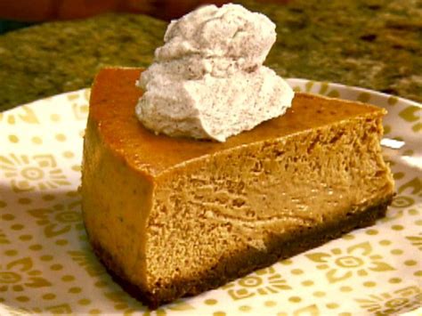 Add granulated sugar and butter extract, beating well. Gina's Pumpkin Cheesecake Recipe | The Neelys | Food Network