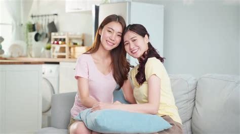 Portrait Of Asian Beautiful Lesbian Woman Couple Smile Spending Time Together Look At Camera