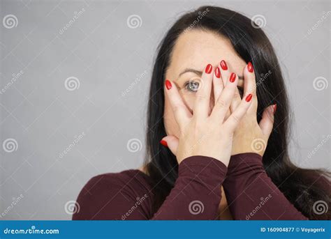 Woman Peeking Through Her Hands Stock Image Image Of Shocked Drama