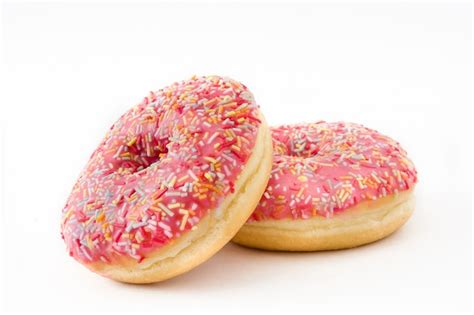 Premium Photo Pink Frosted Donut With Colorful Sprinkles Isolated On